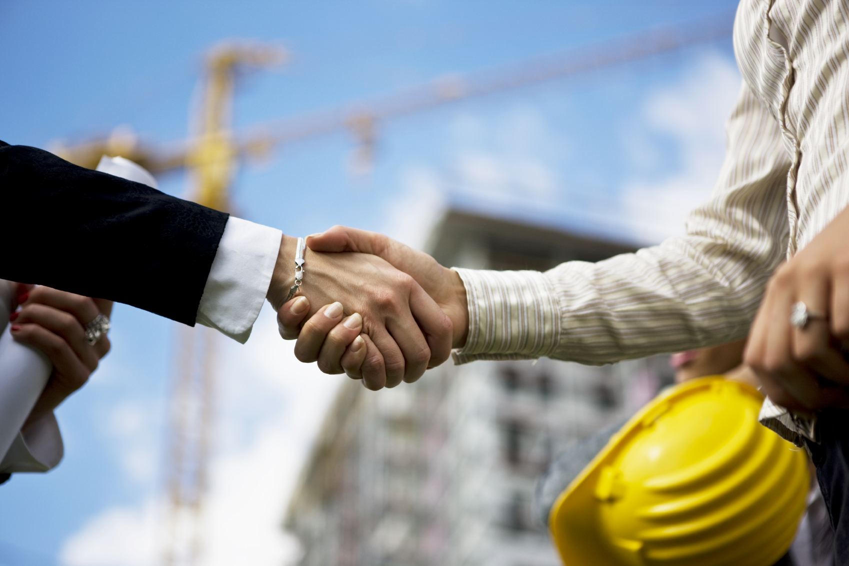 Construction Project - Project Management, Commercial Services, General Contractor Shaking Hands