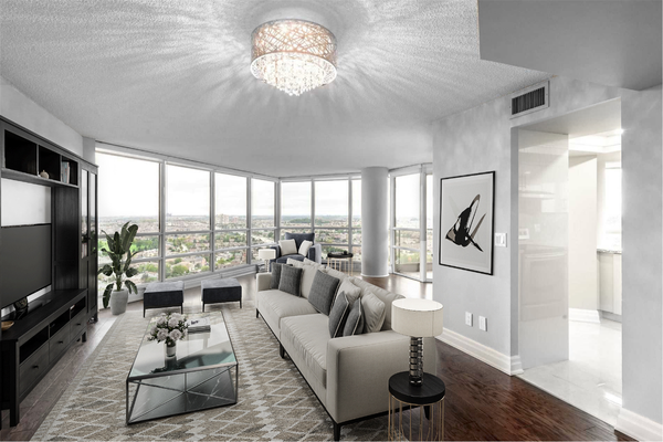Bright open-concept living area after whole home renovation in Mississauga condo