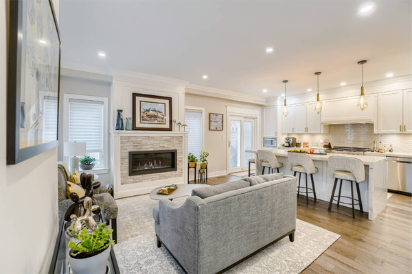 Updated living room with open layout and bright finishes in main floor remodel Richmond Hill