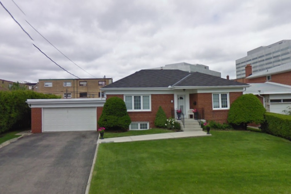 Lot severance and existing property prior to custom home construction in Yorkdale-Glen Park, North York.