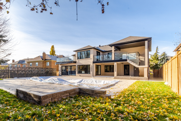 Rear extension with pool, kitchen, and theater room as part of whole home renovation in Bayview Hill, Richmond Hill.