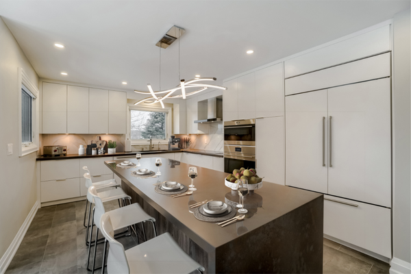 Kitchen renovations King City showing modern cabinets, new island, and built-in appliances