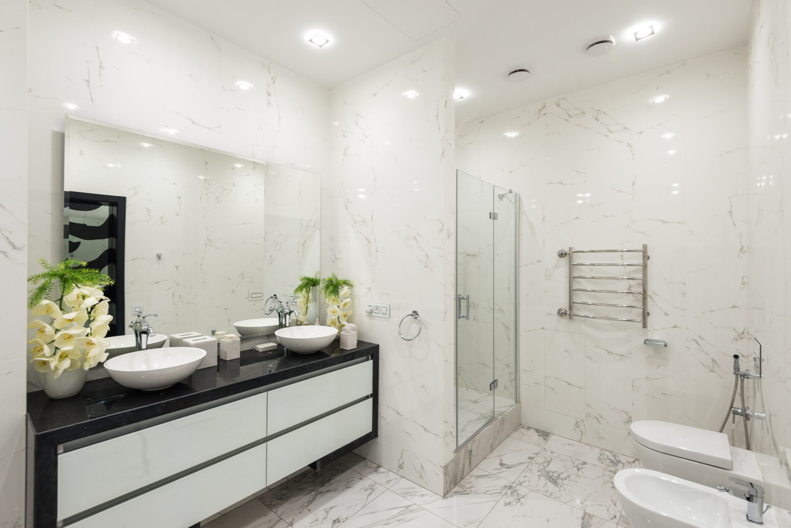 Bathroom Remodeling, Glass Shower, Freestanding Tub, Matching Floor and Wall Tile
